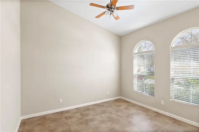a kitchen with granite countertop a sink stainless steel appliances and cabinets