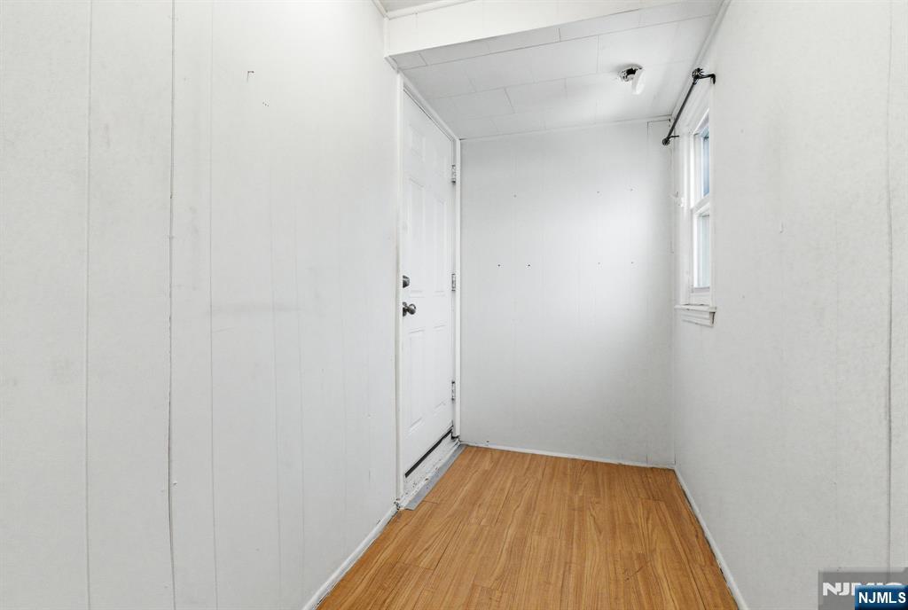 64 John Ryle Avenue Haledon, NJ 07508 - Photo 16 of 44 a view of a room with wooden floor