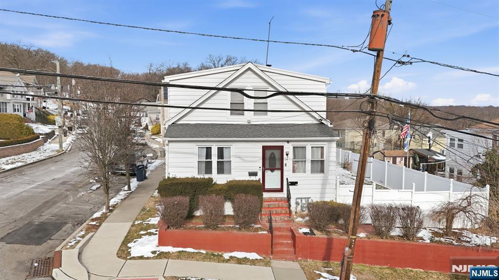 64 John Ryle Avenue Haledon, NJ 07508 - Photo 36 of 44 a view of a house with a street