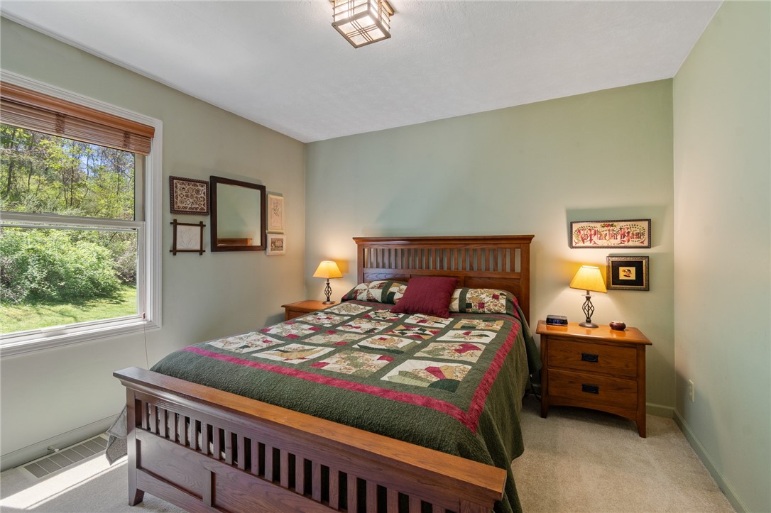 4397 Sebring Road Sodus, NY 14551 - Photo 22 of 43 The FIRST FLOOR BEDROOM and there’s an adjacent FU