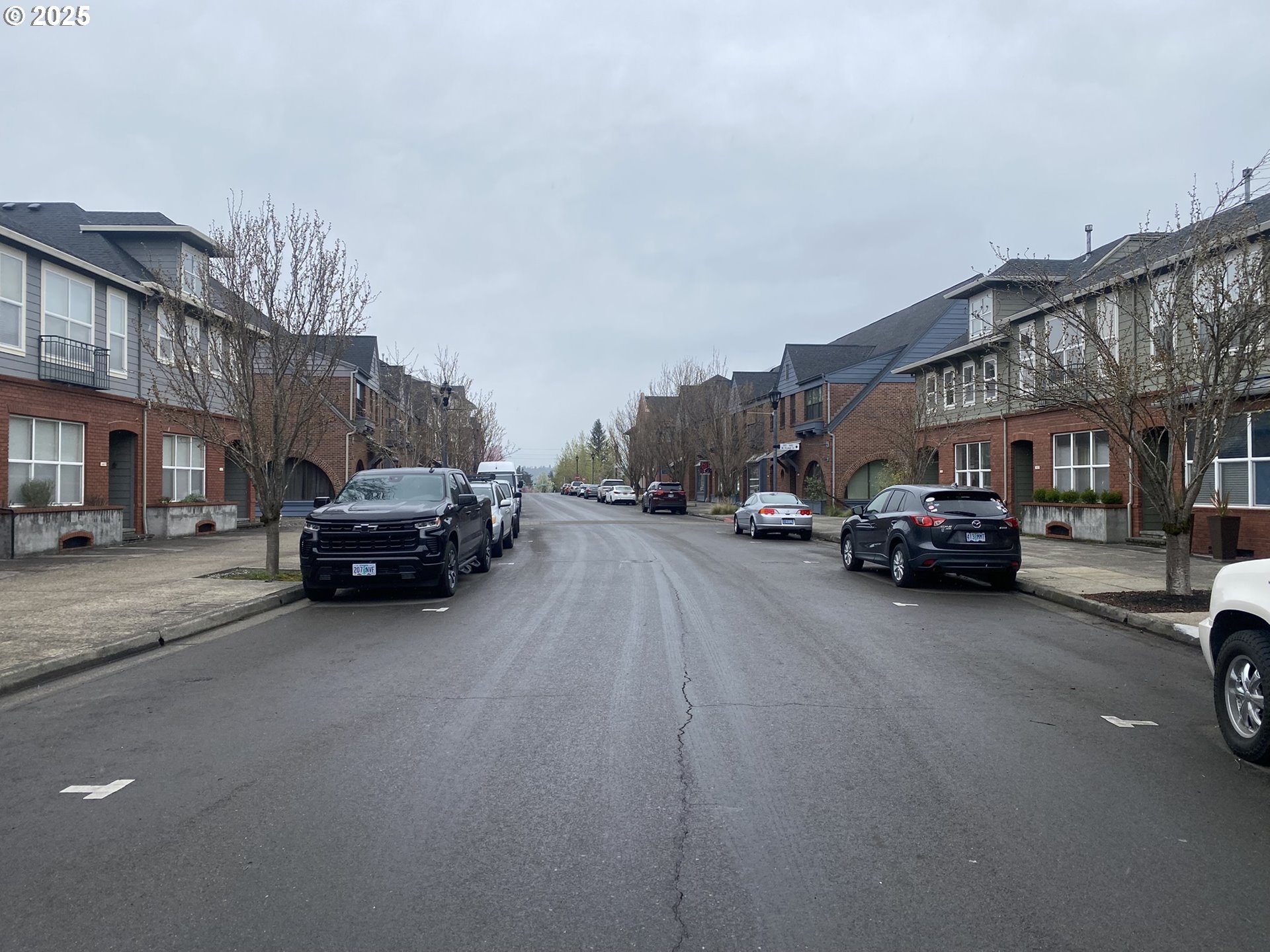 1305 Northeast Village Street Fairview, OR 97024 - Photo 10 of 11 a view of a cars park in front of a building