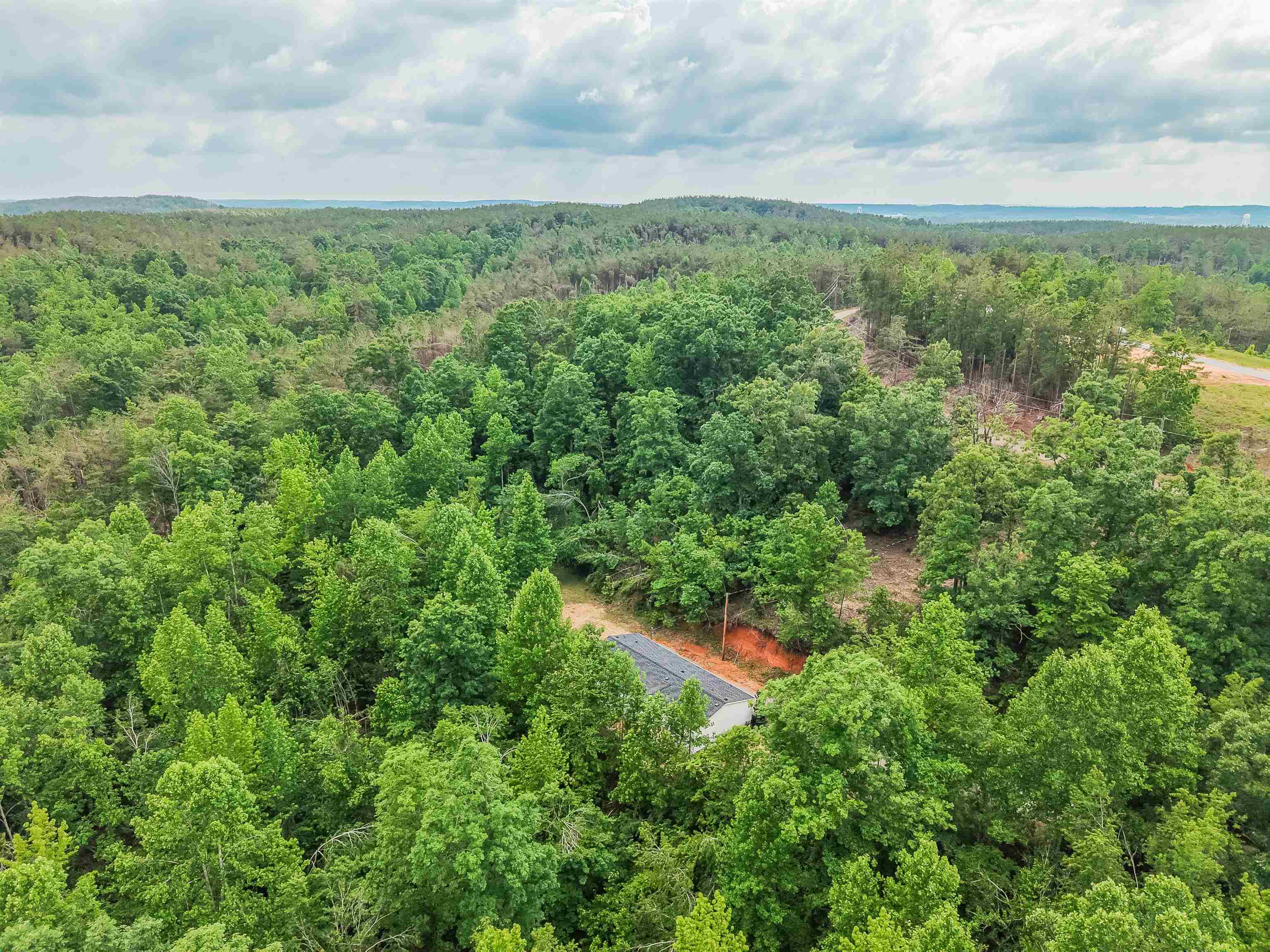 890 Burks Road Savannah, TN 38372 - Photo 31 of 40 an aerial view of a house with a yard