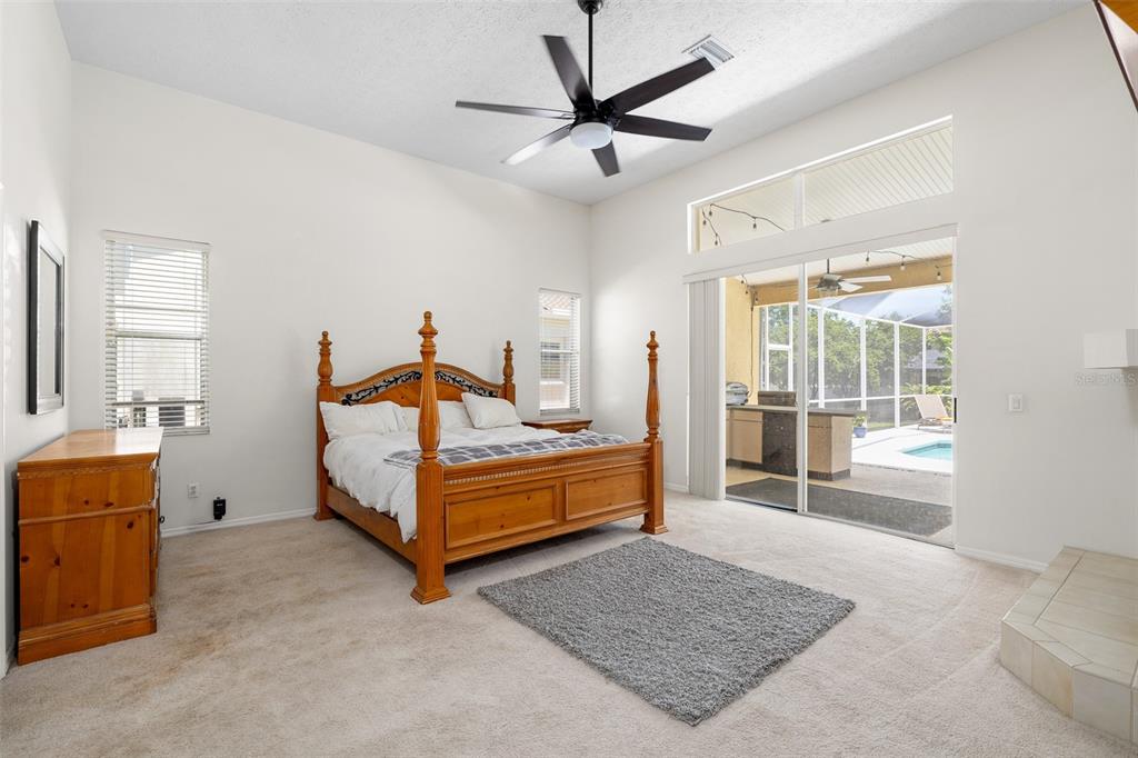 2513 Regal River Road Valrico, FL 33596 - Photo 19 of 46 a bed room with a bed and a window