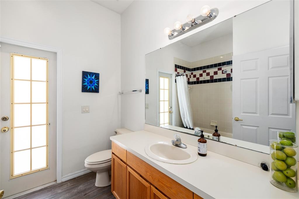2513 Regal River Road Valrico, FL 33596 - Photo 25 of 46 a bathroom with a sink and a mirror