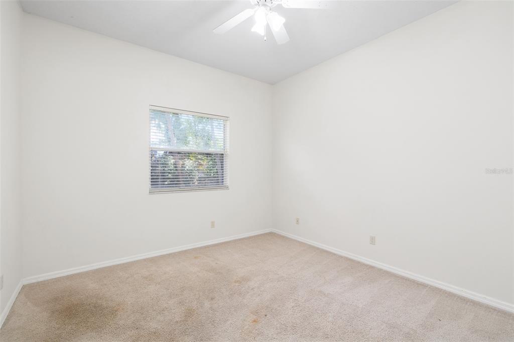 2513 Regal River Road Valrico, FL 33596 - Photo 33 of 46 an empty room with a window
