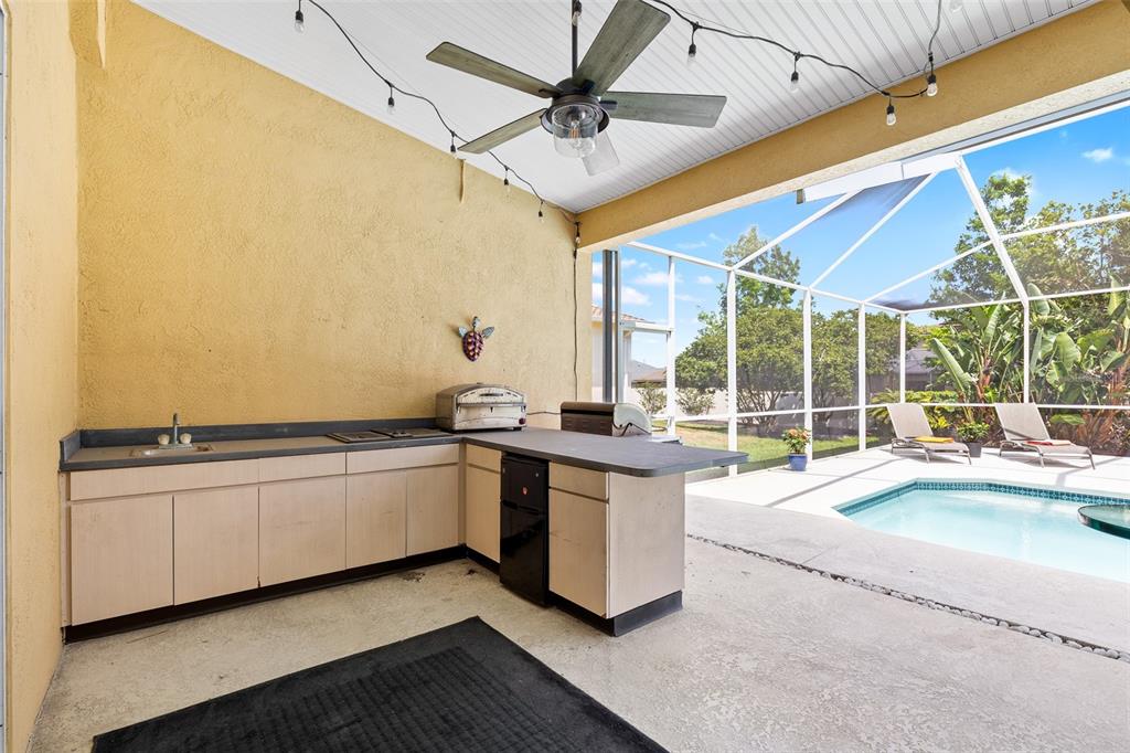 2513 Regal River Road Valrico, FL 33596 - Photo 39 of 46 a large white kitchen with a large window