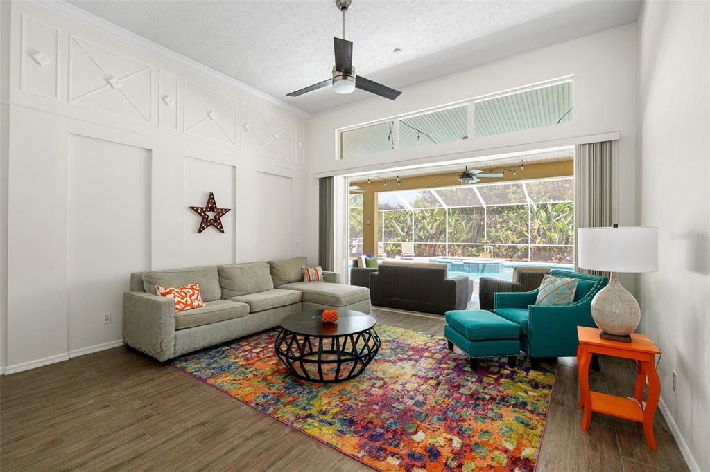 2513 Regal River Road Valrico, FL 33596 - Photo 8 of 46 a living room with furniture and a large window