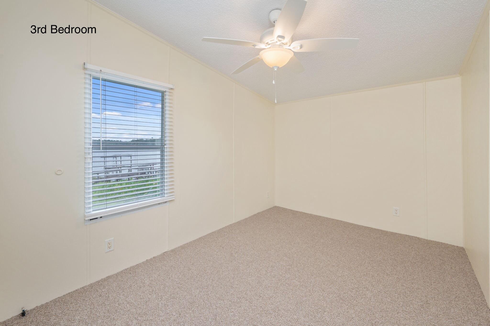 1314 Riddle Drive Westville, FL 32464 - Photo 21 of 35 an empty room with a window