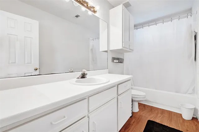 a workspace with furniture and a window