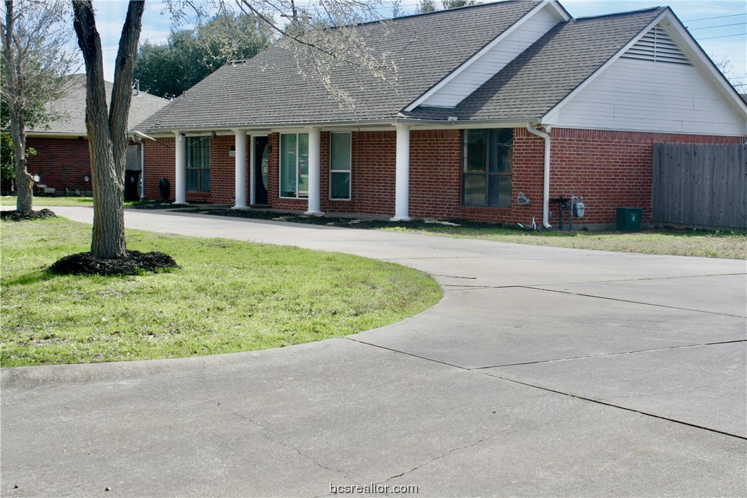a view of a house with a garden