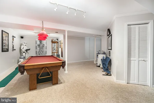 a room with furniture and a chandelier