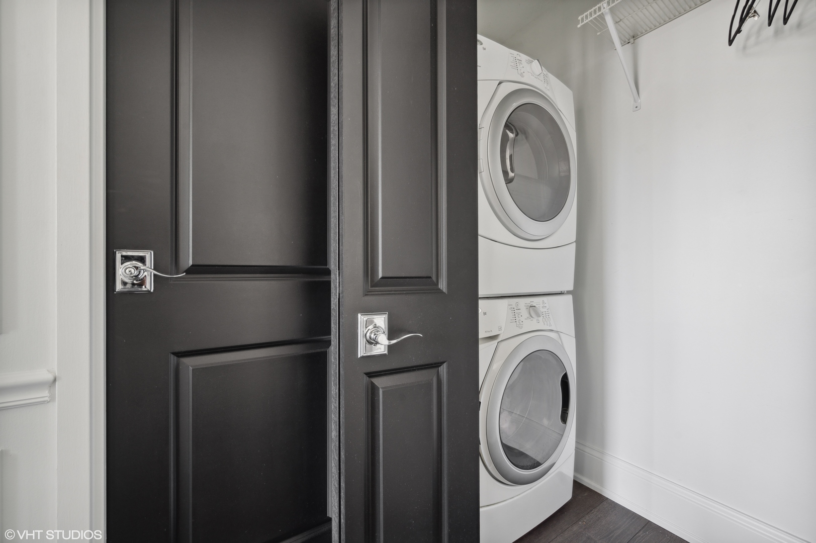 111 East Chestnut Street, Unit 26J Chicago, IL 60611 - Photo 19 of 23 a utility room with dryer and washer