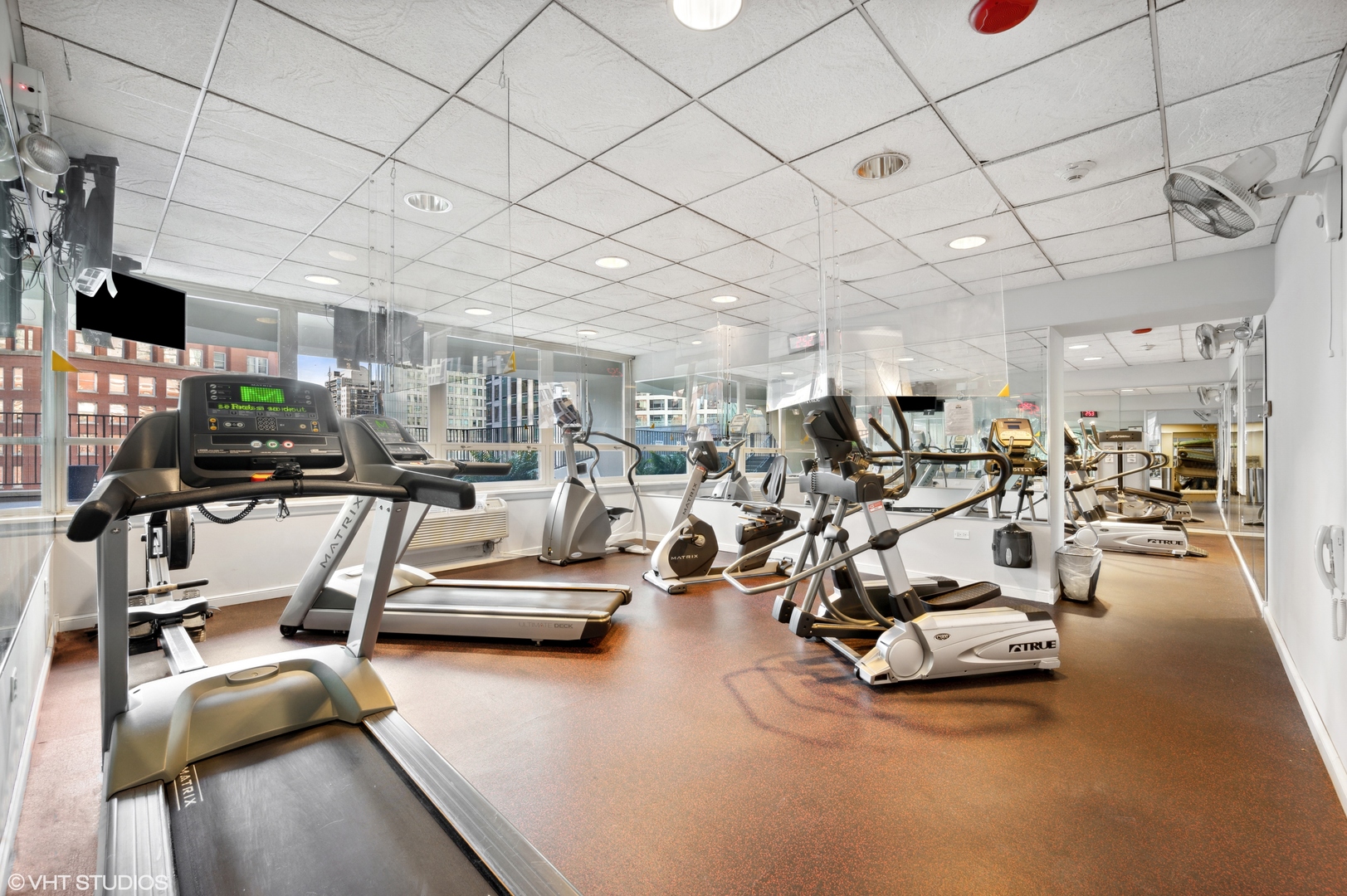 111 East Chestnut Street, Unit 26J Chicago, IL 60611 - Photo 20 of 23 a view of a room with gym equipment