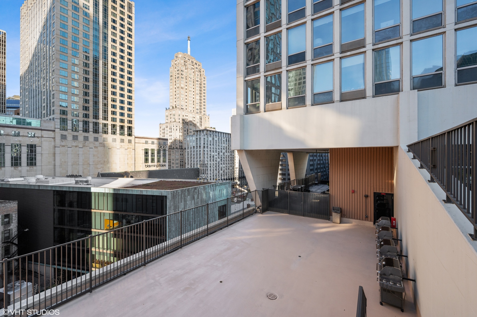 111 East Chestnut Street, Unit 26J Chicago, IL 60611 - Photo 21 of 23 a view of a building with many windows