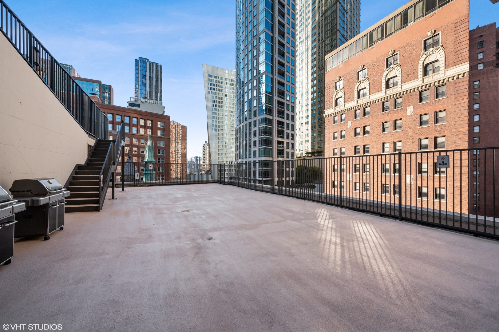 111 East Chestnut Street, Unit 26J Chicago, IL 60611 - Photo 22 of 23 a view of a balcony with staircase