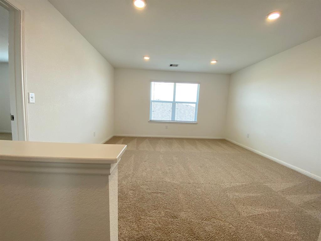 225 Saide Street Georgetown, TX 78626 - Photo 10 of 22 an empty room with a window