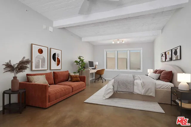 a living room with furniture and a couch