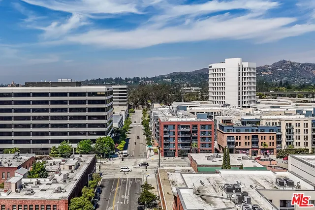 a view of a city with tall buildings