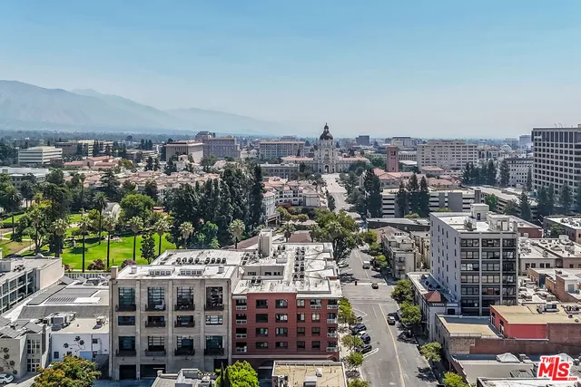 a view of city with tall buildings