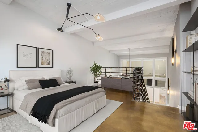 a bedroom with a bed and a walk in closet