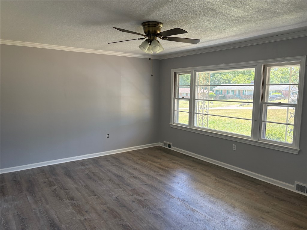 403 Brook Forest Drive Anderson, SC 29621 - Photo 11 of 18 This versatile living space features modern flooring and abundant natural light.