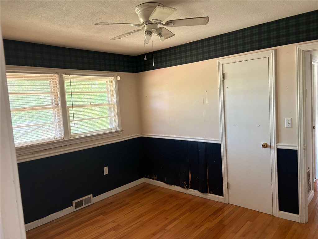 403 Brook Forest Drive Anderson, SC 29621 - Photo 12 of 18 This bright room features beautiful hardwood flooring and ample natural light, perfect for any use.