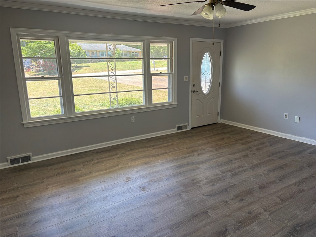 403 Brook Forest Drive Anderson, SC 29621 - Photo 16 of 18 This bright space features ample natural light and durable flooring, ideal for everyday living.