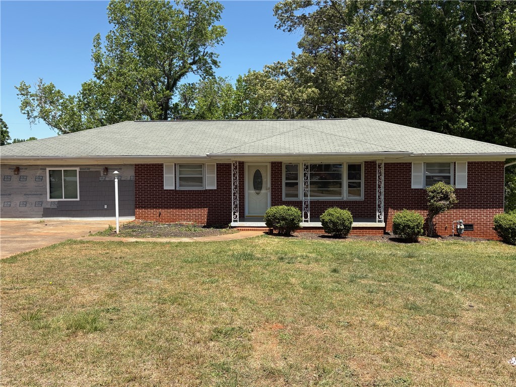 403 Brook Forest Drive Anderson, SC 29621 - Photo 18 of 18 This charming residence features a classic brick exterior, offering both durability and timeless appeal.