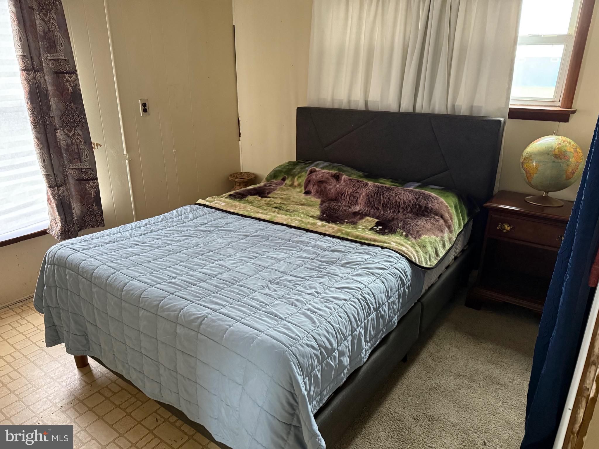 1910 Schubert Road, Unit 4 Bethel, PA 19507 - Photo 12 of 14 a bedroom with a bed and window