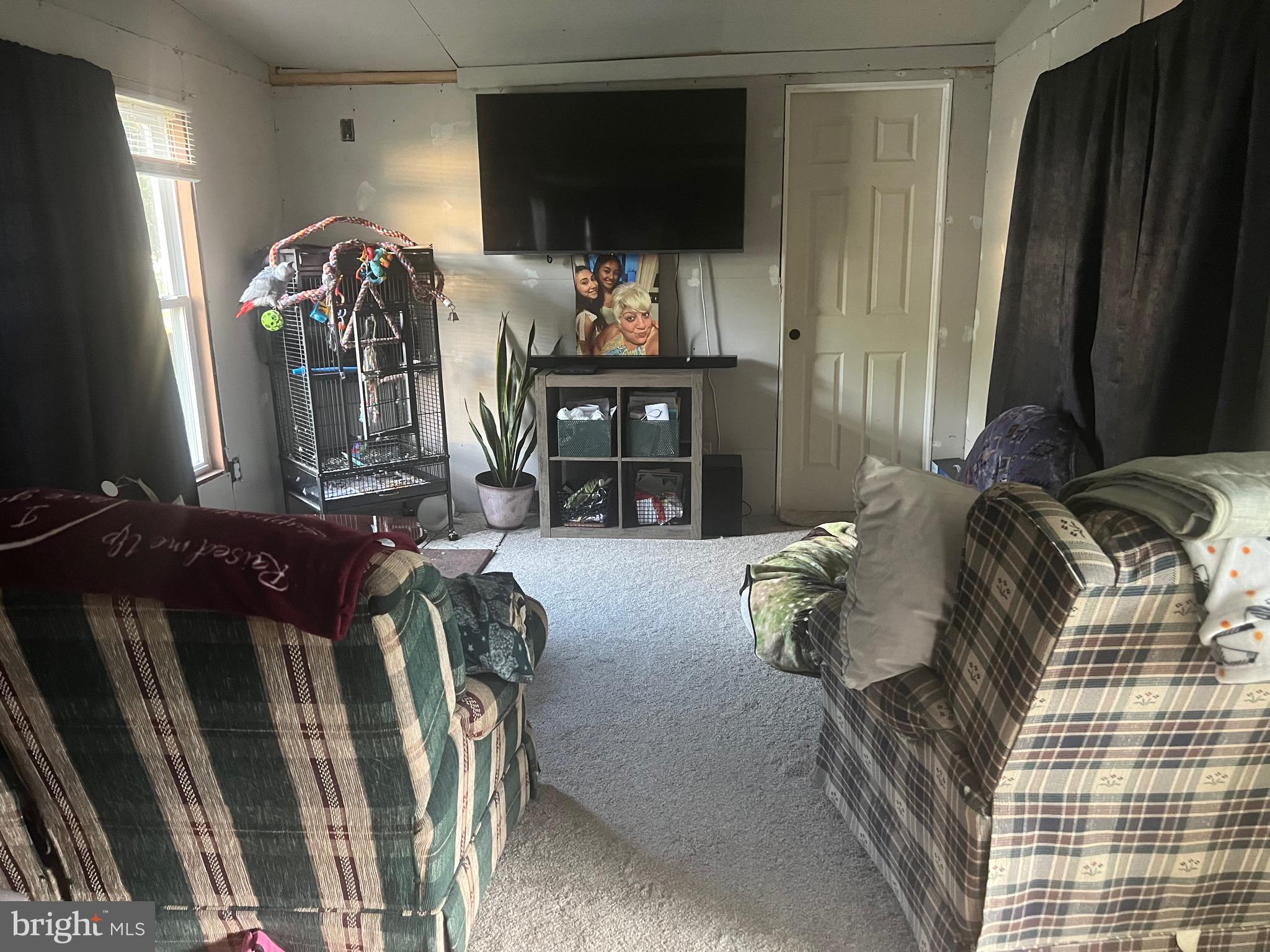 1910 Schubert Road, Unit 4 Bethel, PA 19507 - Photo 7 of 14 a view of living room and window