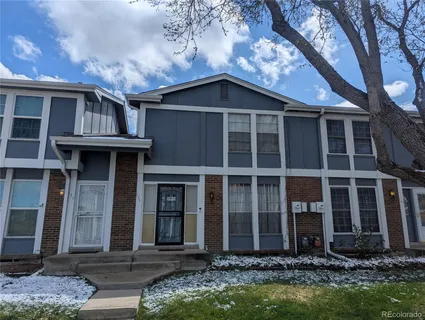 a view of house with yard