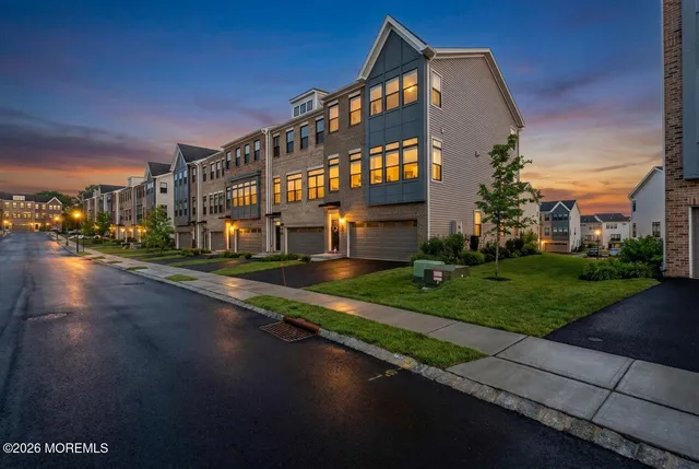 a front view of a building with street view