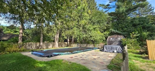 a garden view with a sitting space
