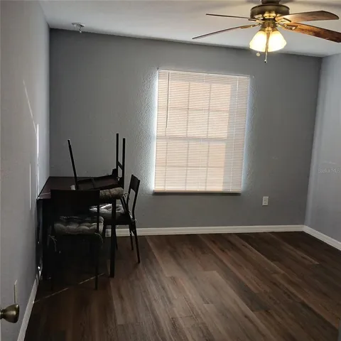 a view of room with hardwood floor