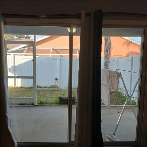 a bathroom with a glass door