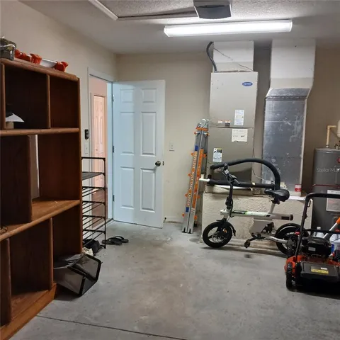 a view of a yard with cars