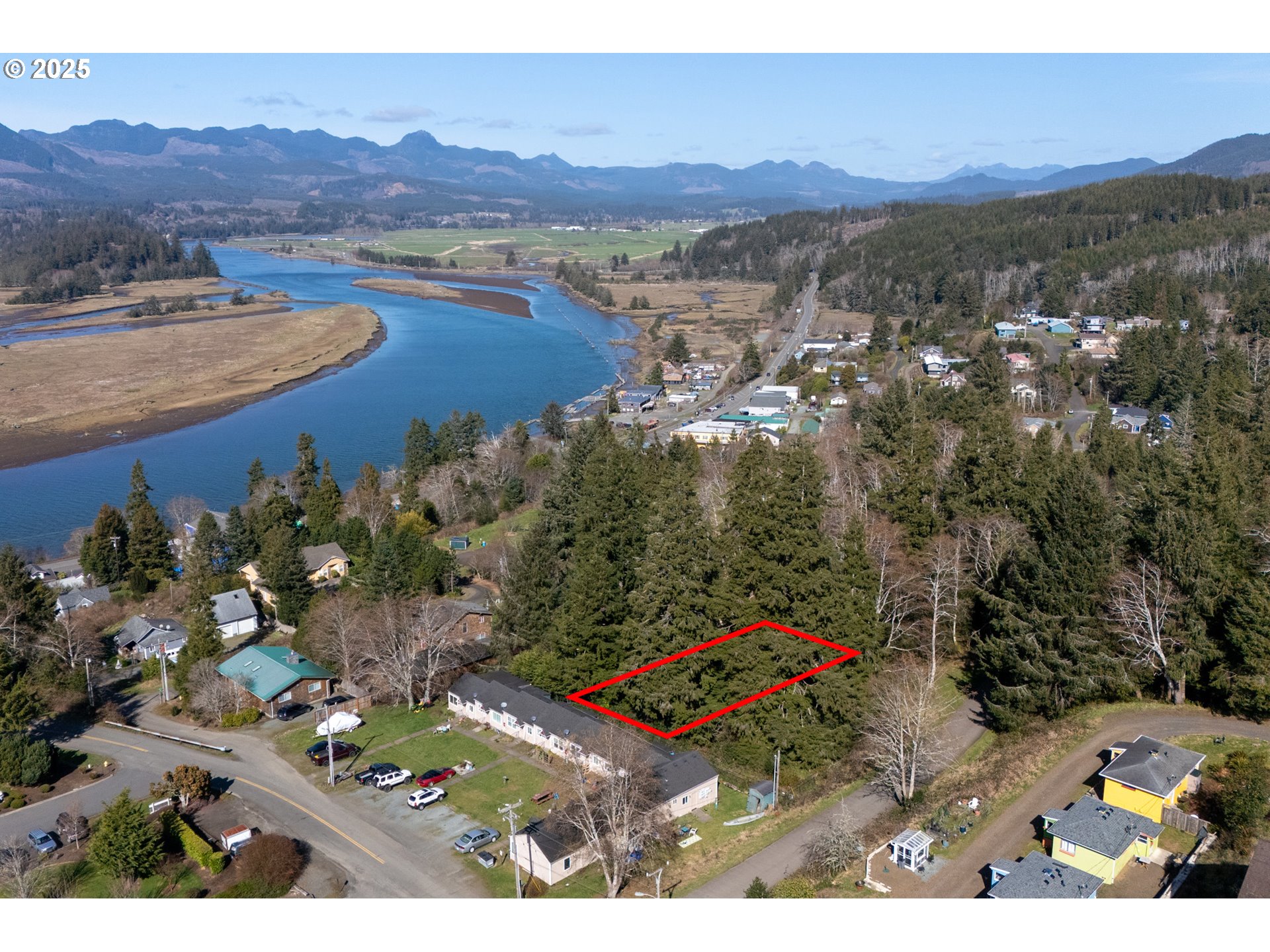 Akin Street, Unit 7300 Wheeler, OR 97147 - Photo 2 of 20 an aerial view of residential houses with outdoor space