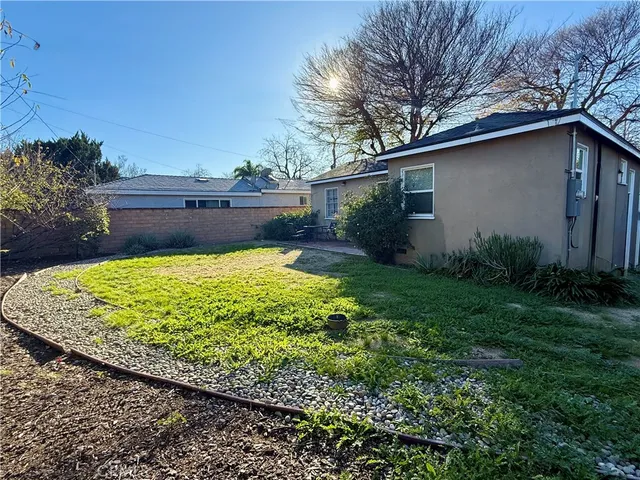 a view of a backyard with plants