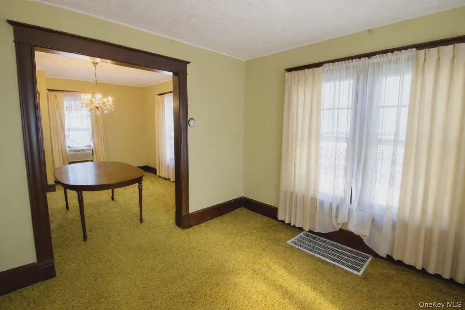 409 Baker Street Poughkeepsie, NY 12603 - Photo 9 of 23 a view of room with furniture and a window