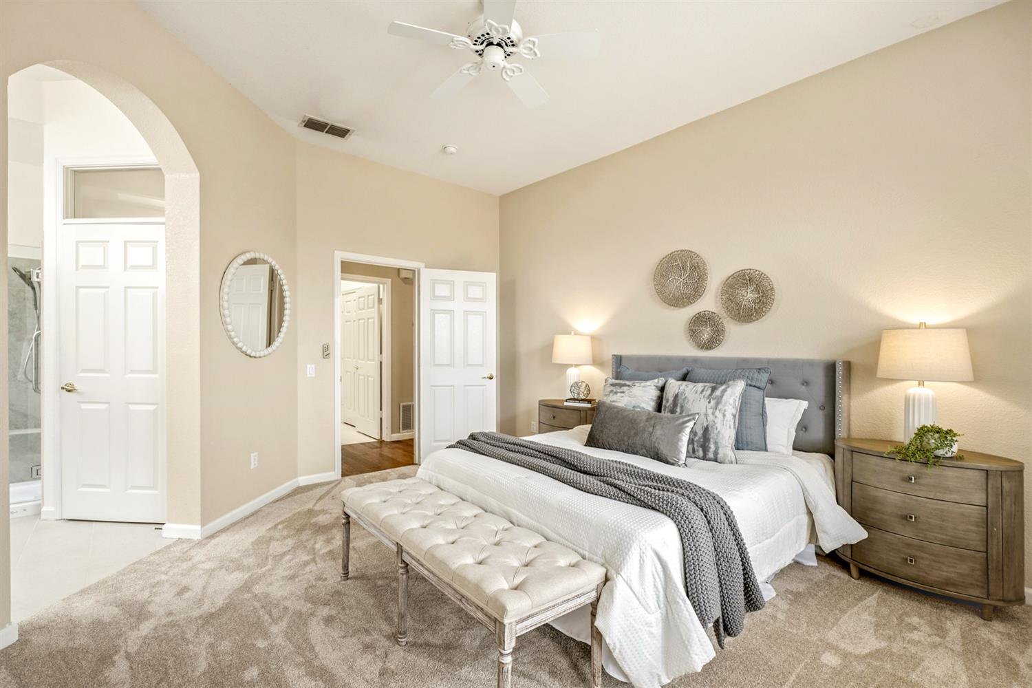 4081 Rose Creek Road Roseville, CA 95747 - Photo 24 of 52 a bedroom with a bed and a chandelier