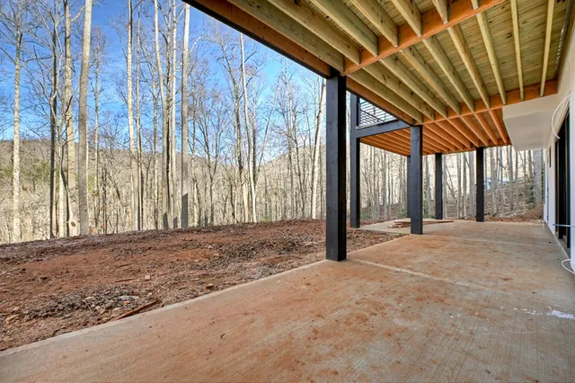 a view of a room with a large window