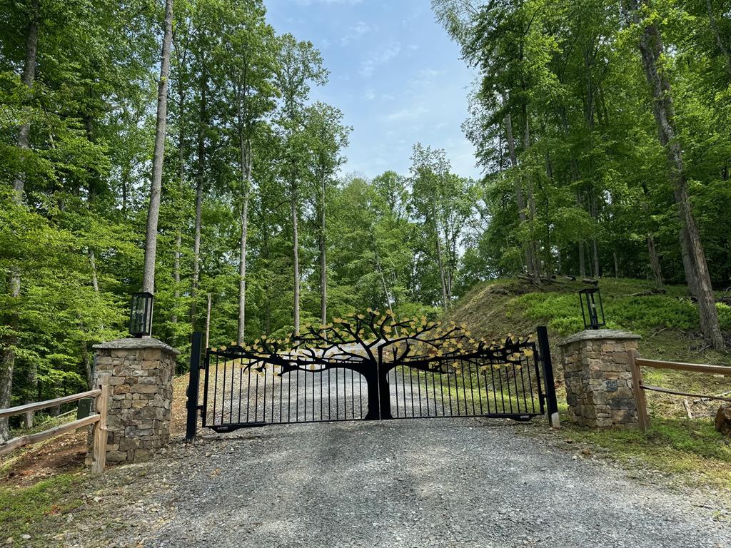 2 Grand Oaks S/d Morganton, GA 30560 - Photo 2 of 30 a view of a wrought iron fences in front of house