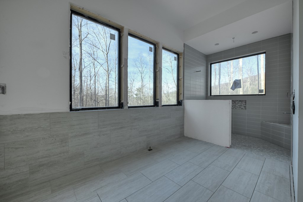 2 Grand Oaks S/d Morganton, GA 30560 - Photo 24 of 30 a view of an empty room with windows and bathroom