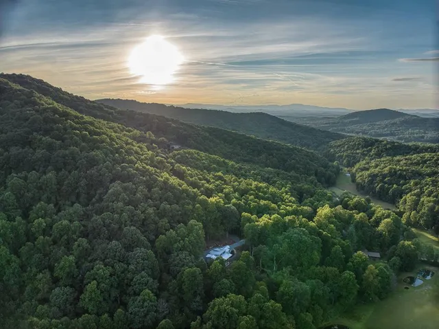 a view of an ocean and a mountain