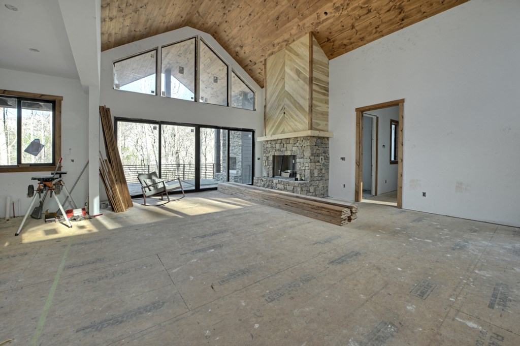 2 Grand Oaks S/d Morganton, GA 30560 - Photo 8 of 30 a view of an empty room with a fireplace and windows