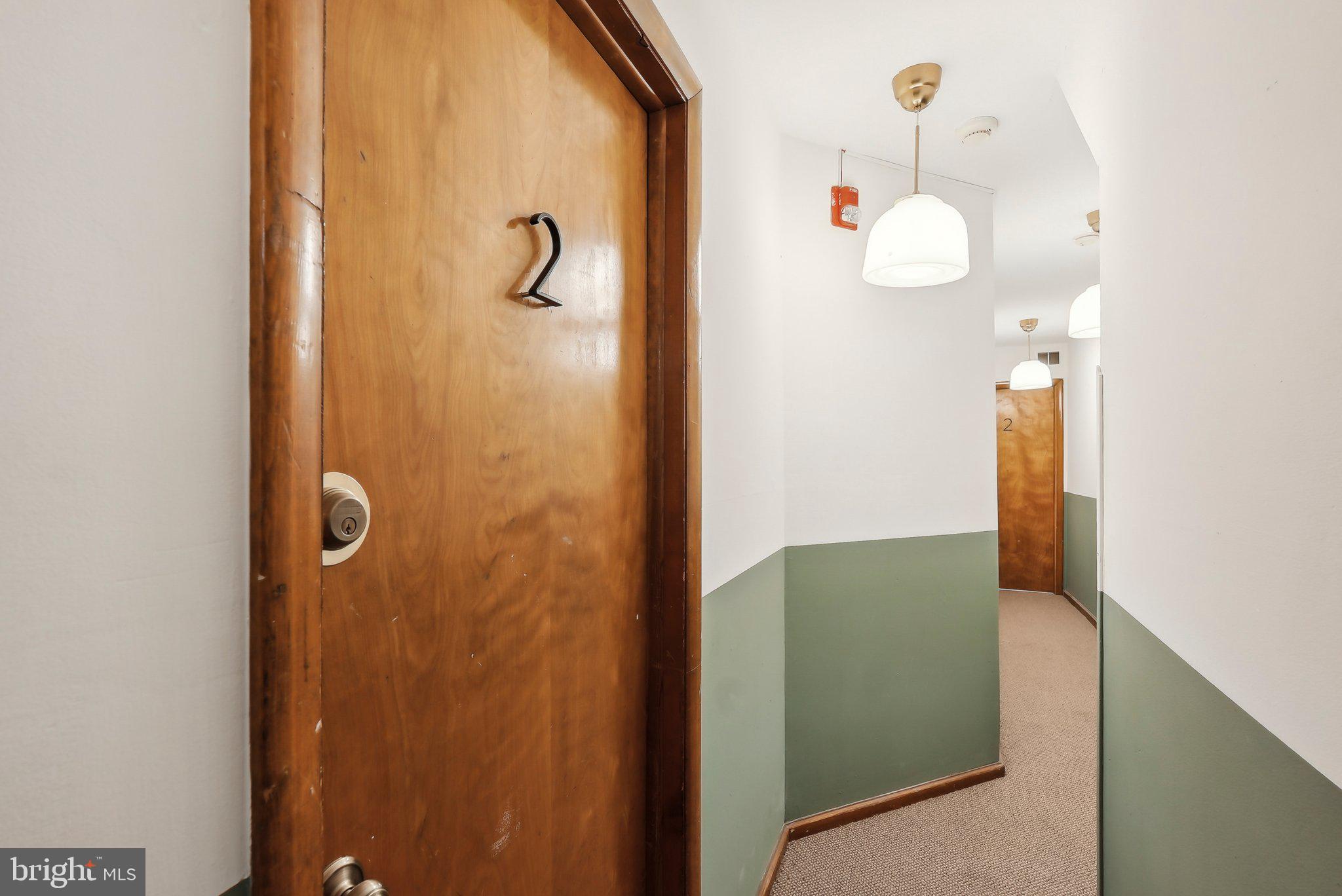 824 Fitzwater Street, Unit 2F Philadelphia, PA 19147 - Photo 11 of 13 a bathroom with a shower and a mirror