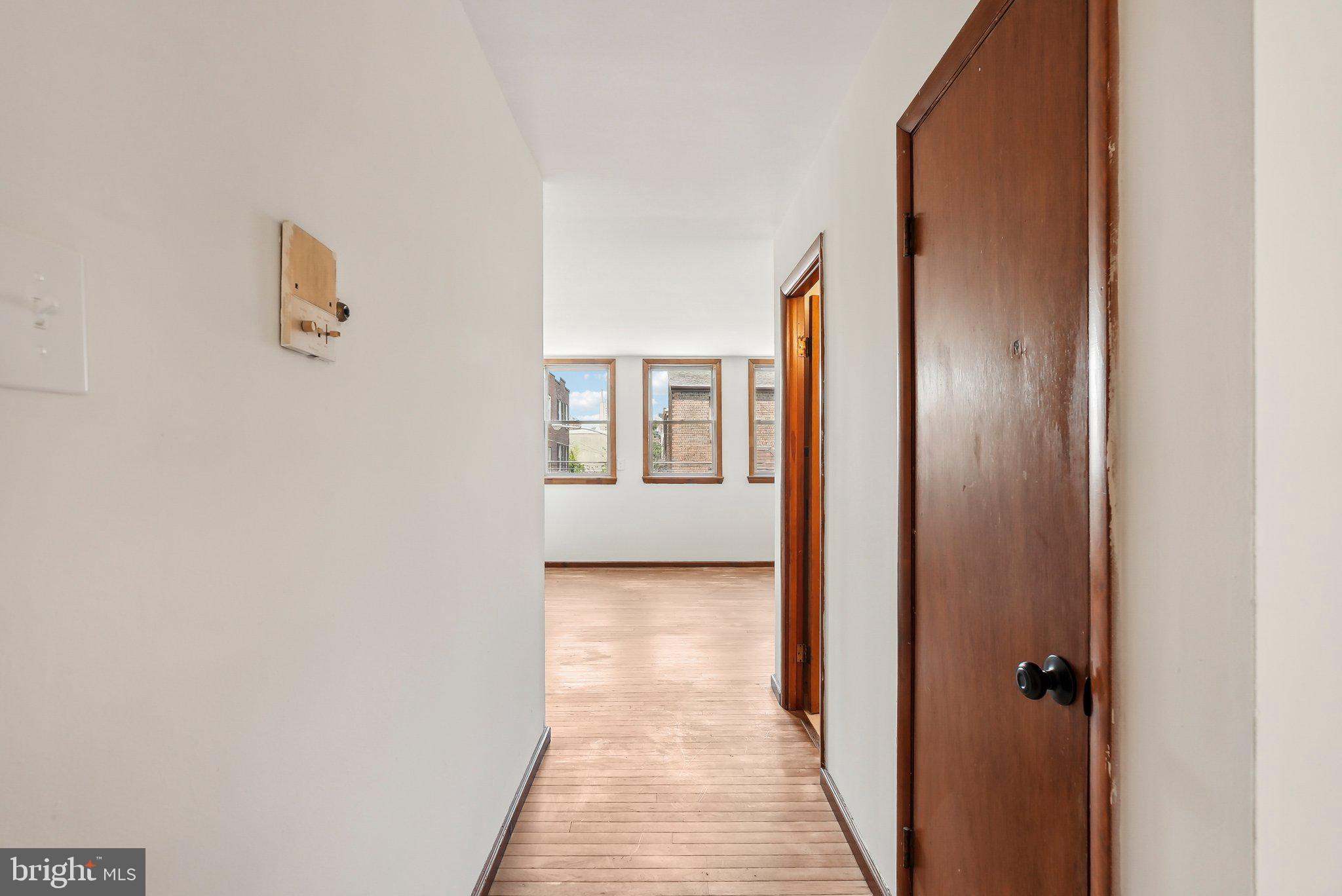 824 Fitzwater Street, Unit 2F Philadelphia, PA 19147 - Photo 4 of 13 a view of a hallway