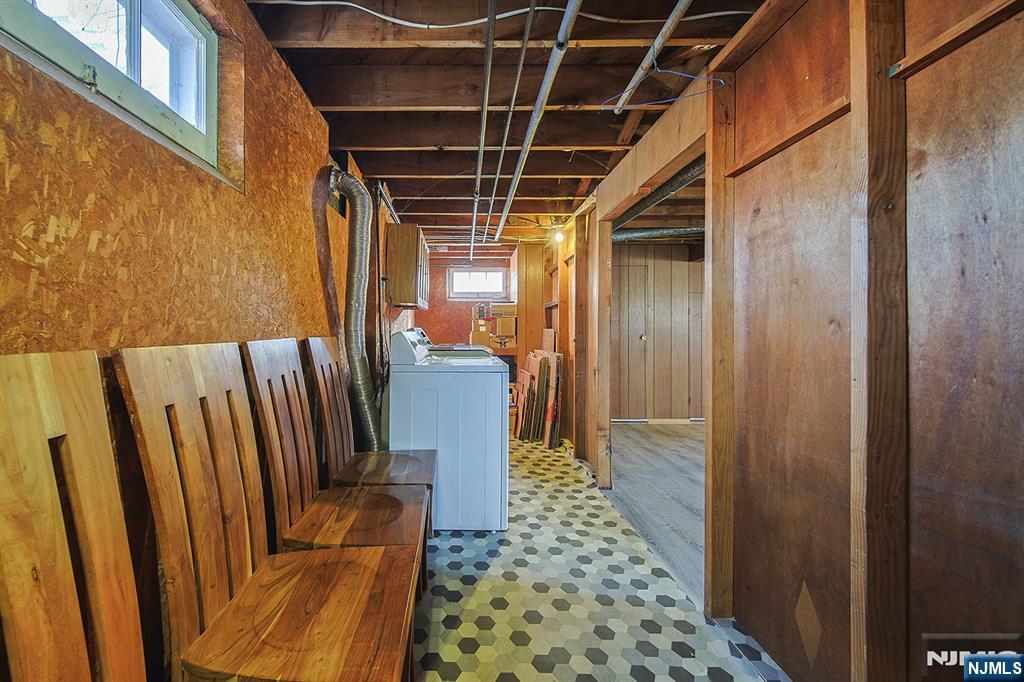50 Knolls Road Bloomingdale, NJ 07403 - Photo 27 of 36 a view of a refrigerator and wooden floor