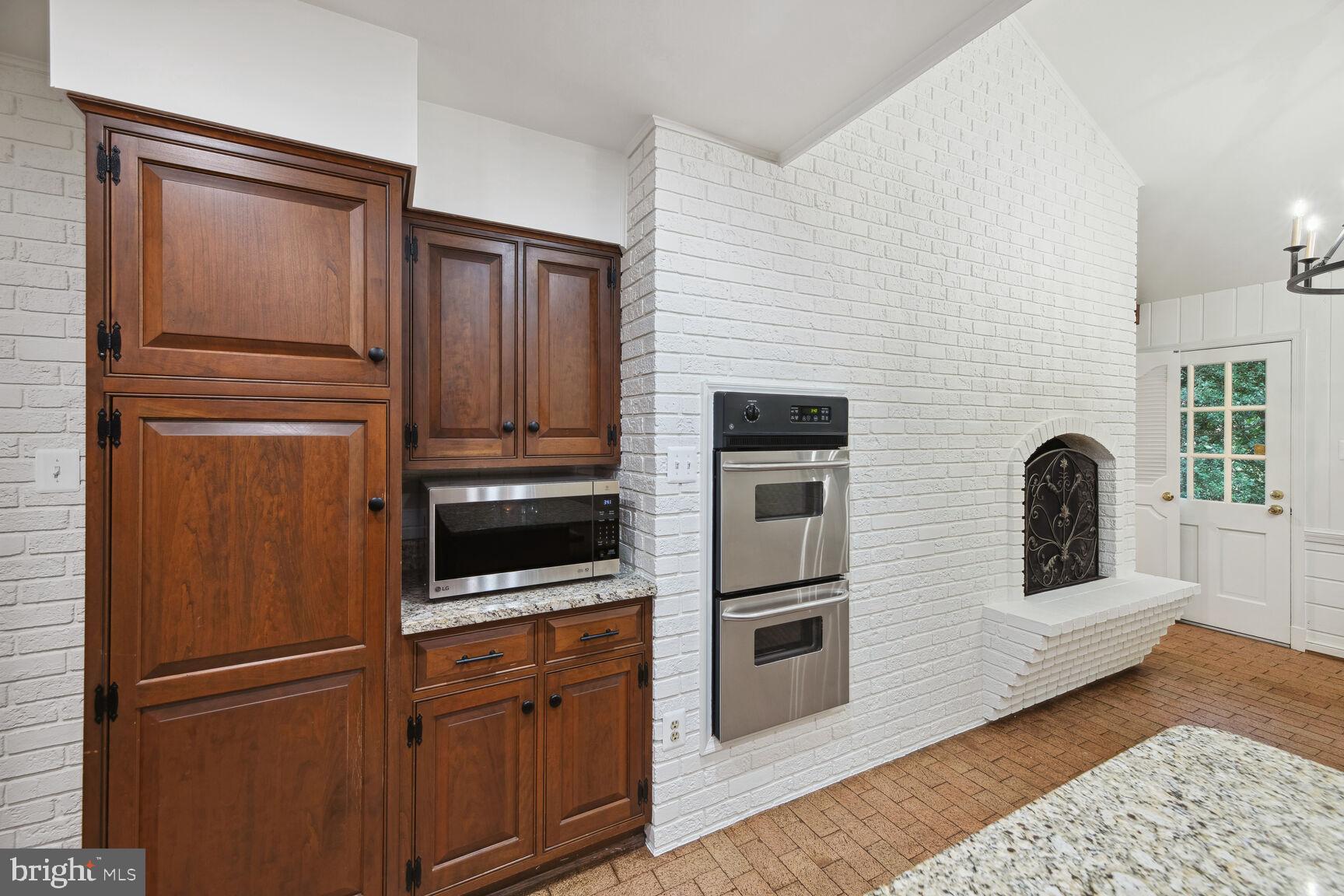 6313 Stoneham Lane McLean, VA 22101 - Photo 15 of 37 Freshly painted exposed brick