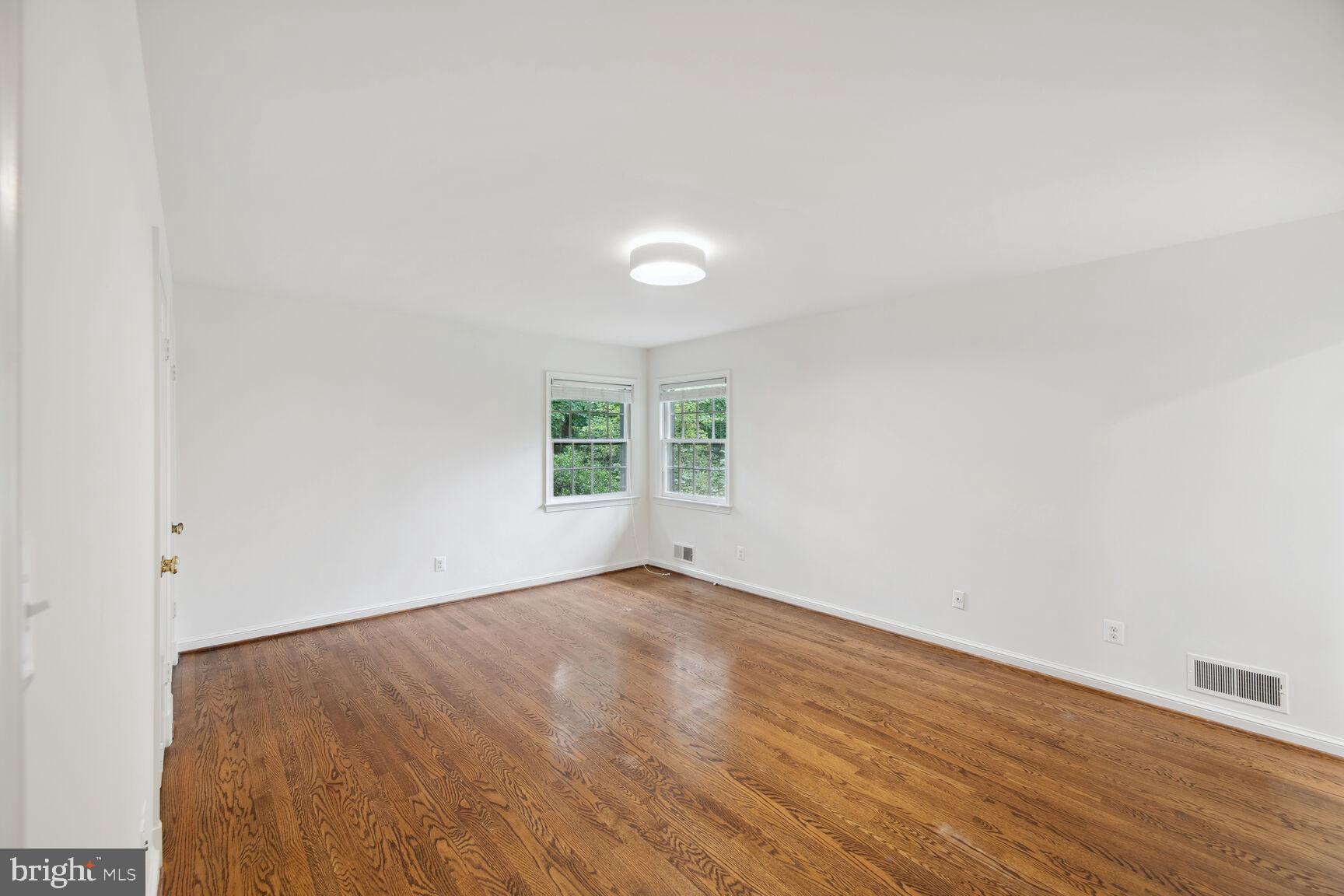 6313 Stoneham Lane McLean, VA 22101 - Photo 19 of 37 Large primary bedroom with new lighting
